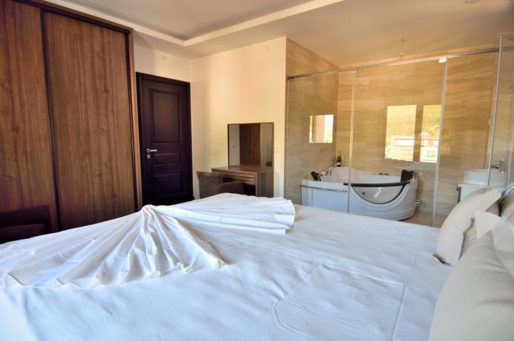 For sale exclusive penthouse with swimming pool and panoramic sea view in Budva!