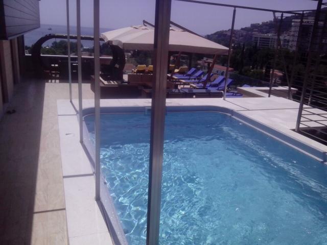 For sale exclusive penthouse with swimming pool and panoramic sea view in Budva!