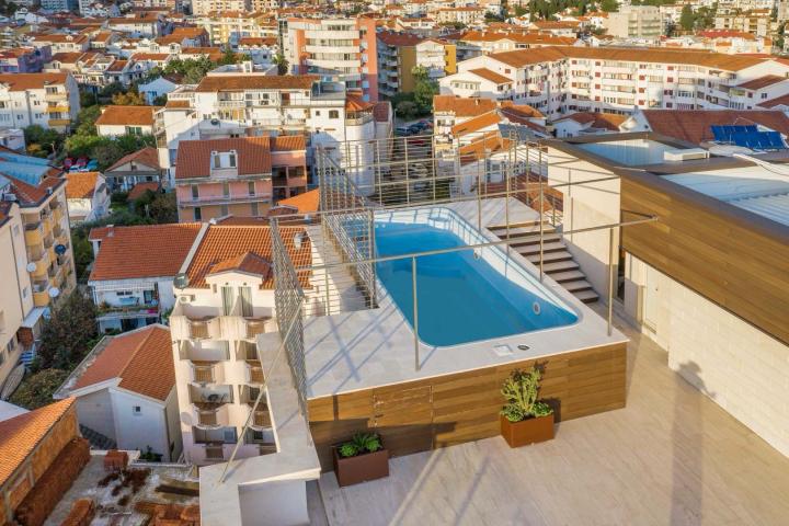 For sale exclusive penthouse with swimming pool and panoramic sea view in Budva!