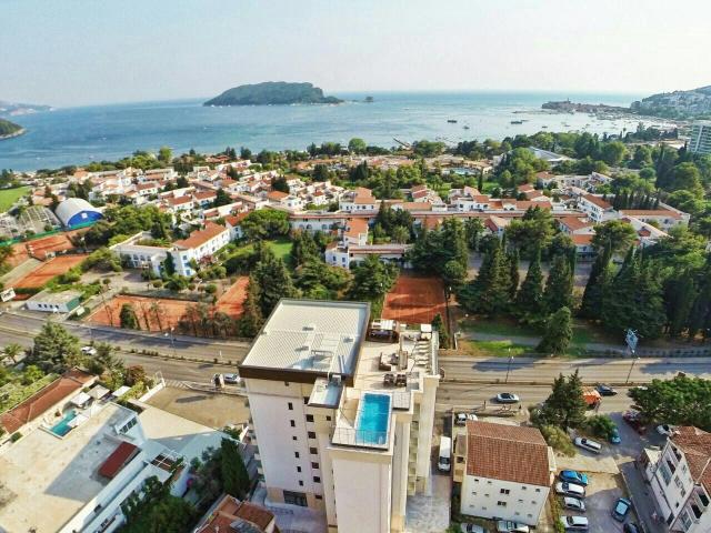 For sale exclusive penthouse with swimming pool and panoramic sea view in Budva!