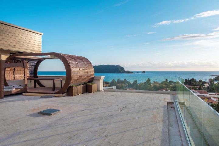 For sale exclusive penthouse with swimming pool and panoramic sea view in Budva!