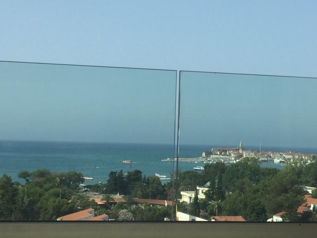 For sale exclusive penthouse with swimming pool and panoramic sea view in Budva!