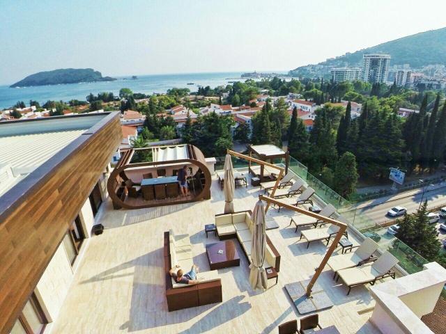 For sale exclusive penthouse with swimming pool and panoramic sea view in Budva!