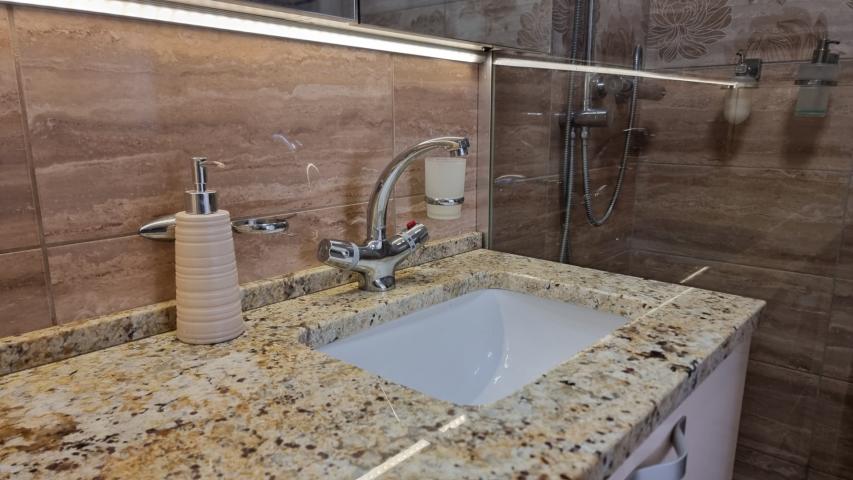 Apartment with spacious terrace and garage space, Becici