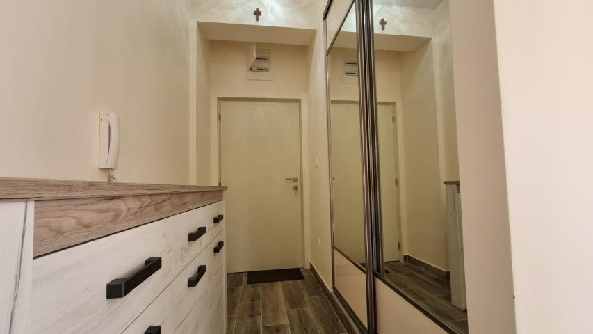 Apartment with spacious terrace and garage space, Becici