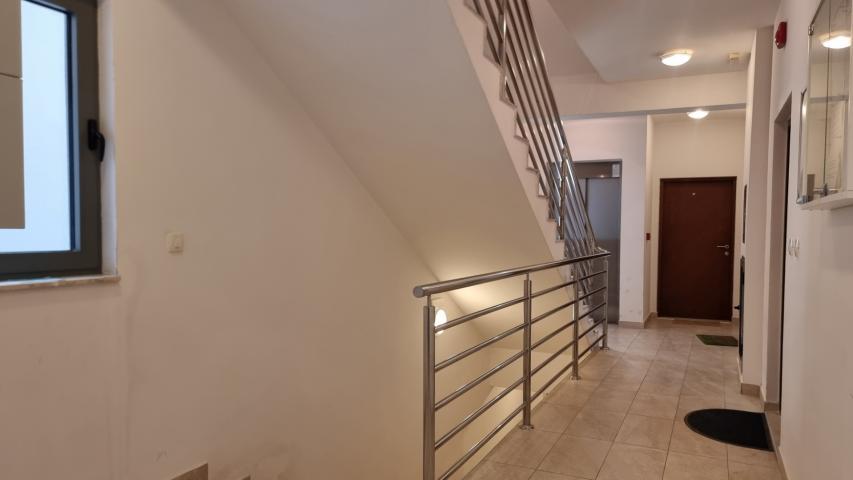 Apartment with spacious terrace and garage space, Becici