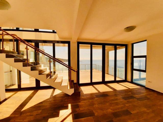 Villa on the first coastline with private beach and pool