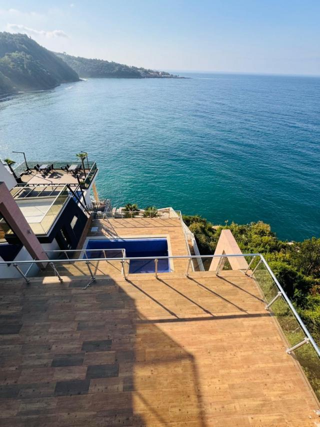 Villa on the first coastline with private beach and pool