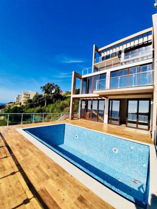 Villa on the first coastline with private beach and pool