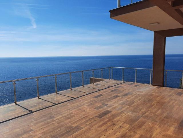 Villa on the first coastline with private beach and pool