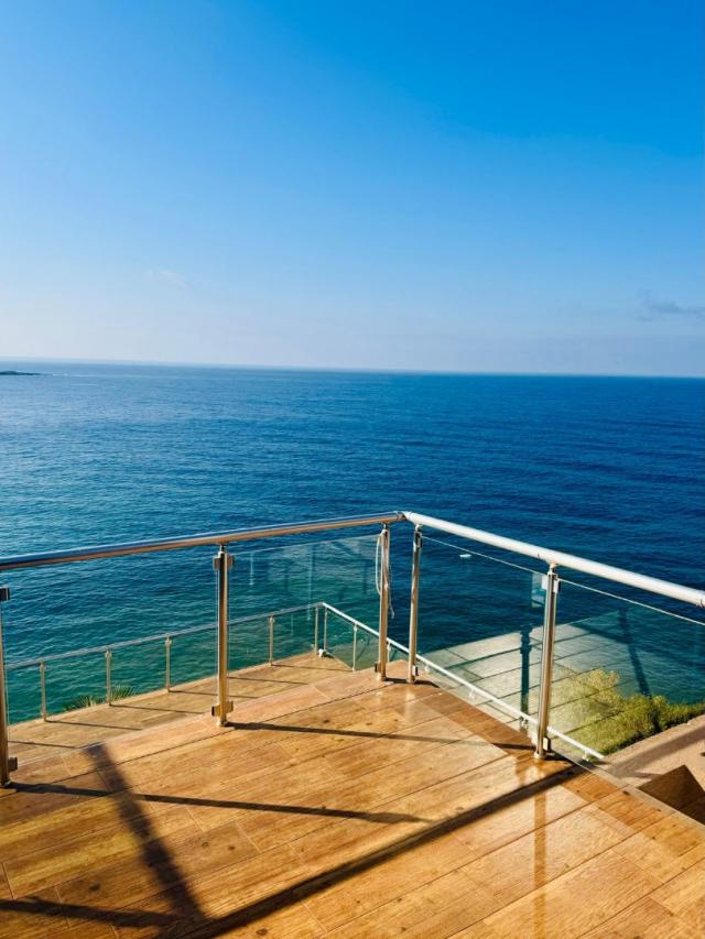 Villa on the first coastline with private beach and pool