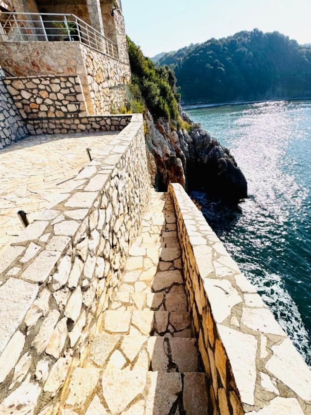 Villa on the first coastline with private beach and pool