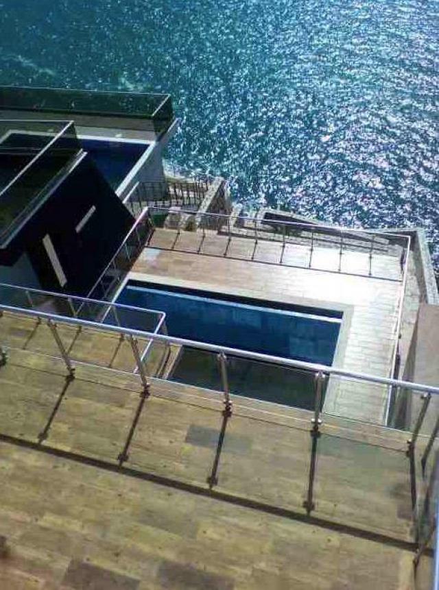 Villa on the first coastline with private beach and pool