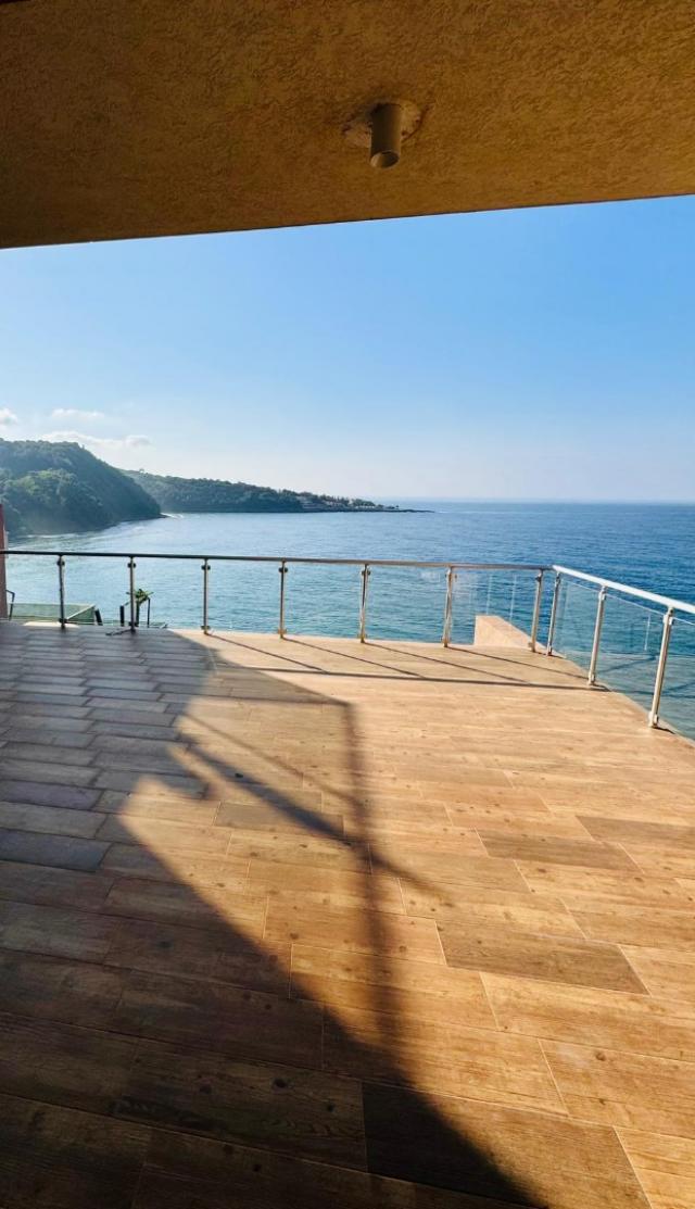 Villa on the first coastline with private beach and pool