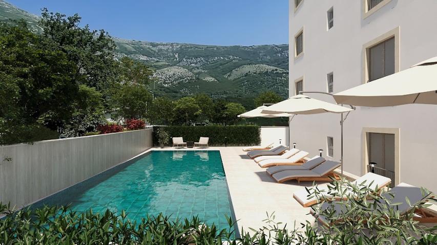 Cozy apartment by the sea in a complex with a swimming pool and spa