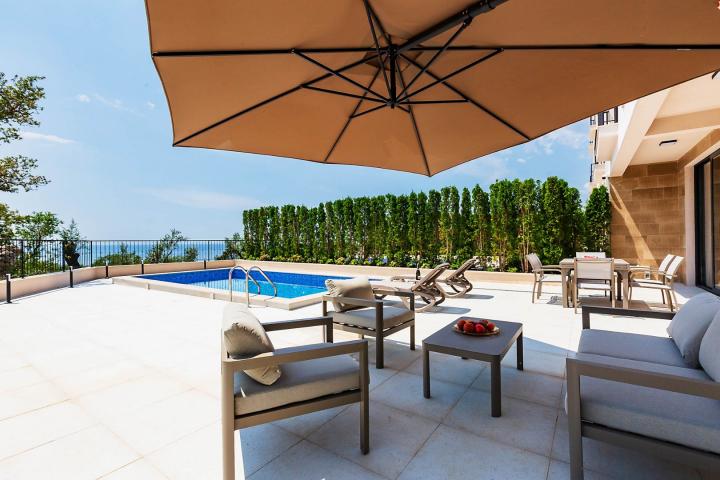 Townhouse with panoramic views of the Adriatic Sea in a gated complex in the Budva Riviera
