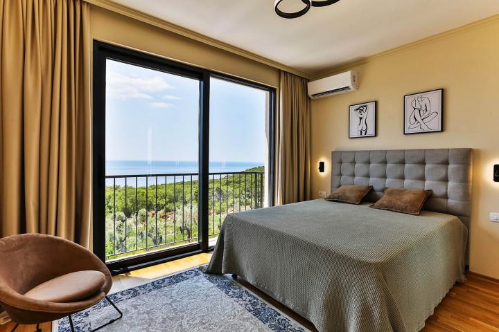 Townhouse with panoramic views of the Adriatic Sea in a gated complex in the Budva Riviera