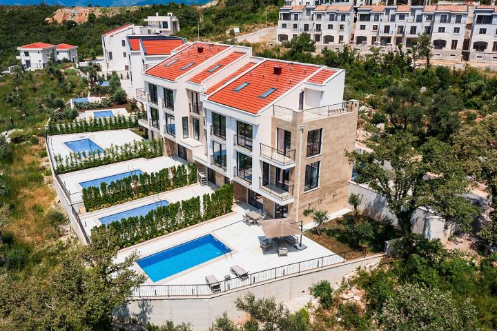 Townhouse with panoramic views of the Adriatic Sea in a gated complex in the Budva Riviera