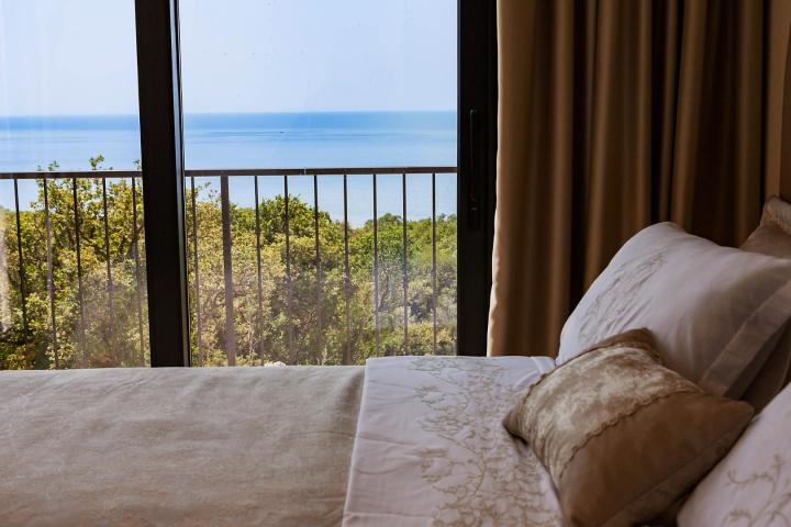 Townhouse with panoramic views of the Adriatic Sea in a gated complex in the Budva Riviera