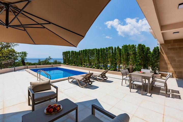 Townhouse with panoramic views of the Adriatic Sea in a gated complex in the Budva Riviera