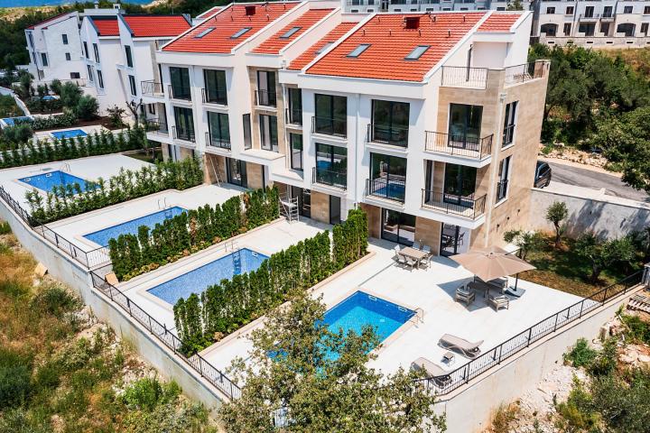 Townhouse with panoramic views of the Adriatic Sea in a gated complex in the Budva Riviera