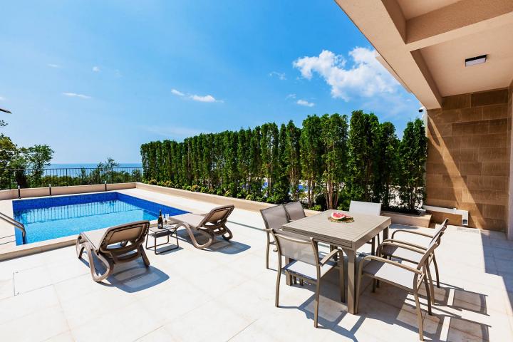 Townhouse with panoramic views of the Adriatic Sea in a gated complex in the Budva Riviera