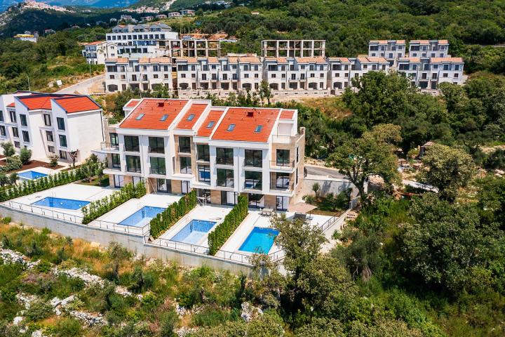 Townhouse with panoramic views of the Adriatic Sea in a gated complex in the Budva Riviera