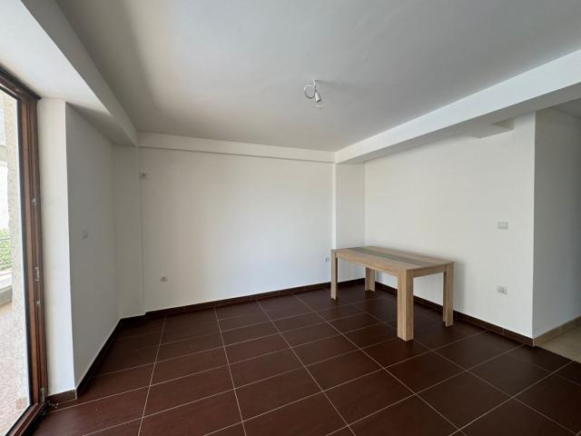 Two-bedroom apartment for sale near the sea in Dobra Voda, in a building with a swimming pool. 
