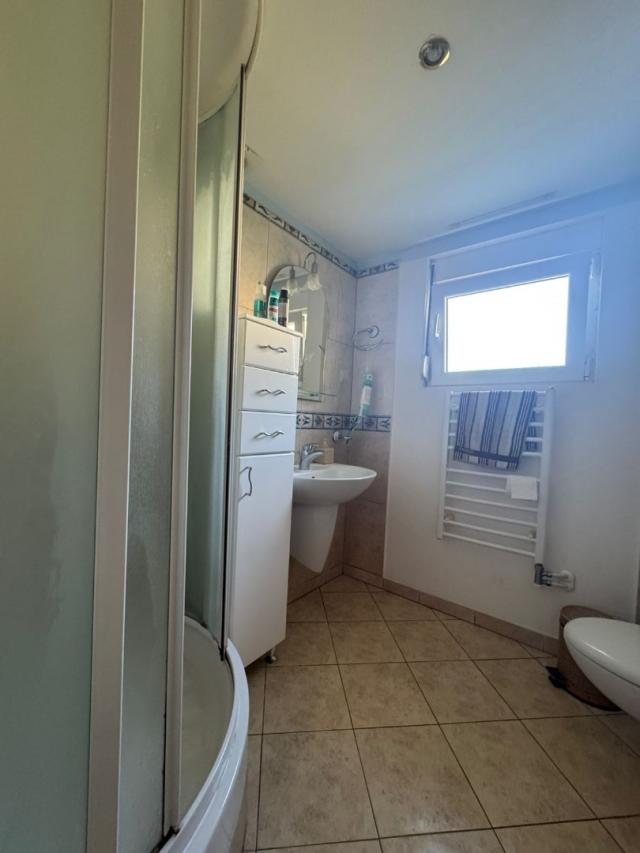 A cozy two-story house in Sutomore is for sale. 