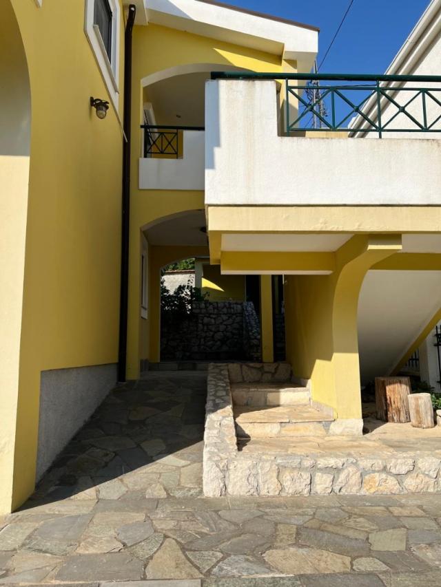 A cozy two-story house in Sutomore is for sale. 