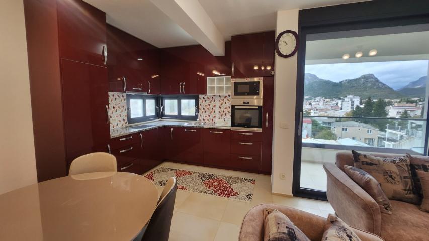 Apartment in a new building in the center of Sutomore, 52 m2