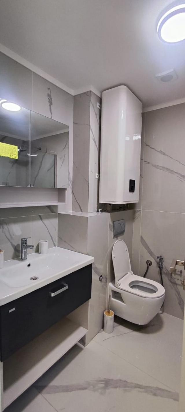 A studio apartment in a new modern residential complex with a swimming pool is for sale. 
