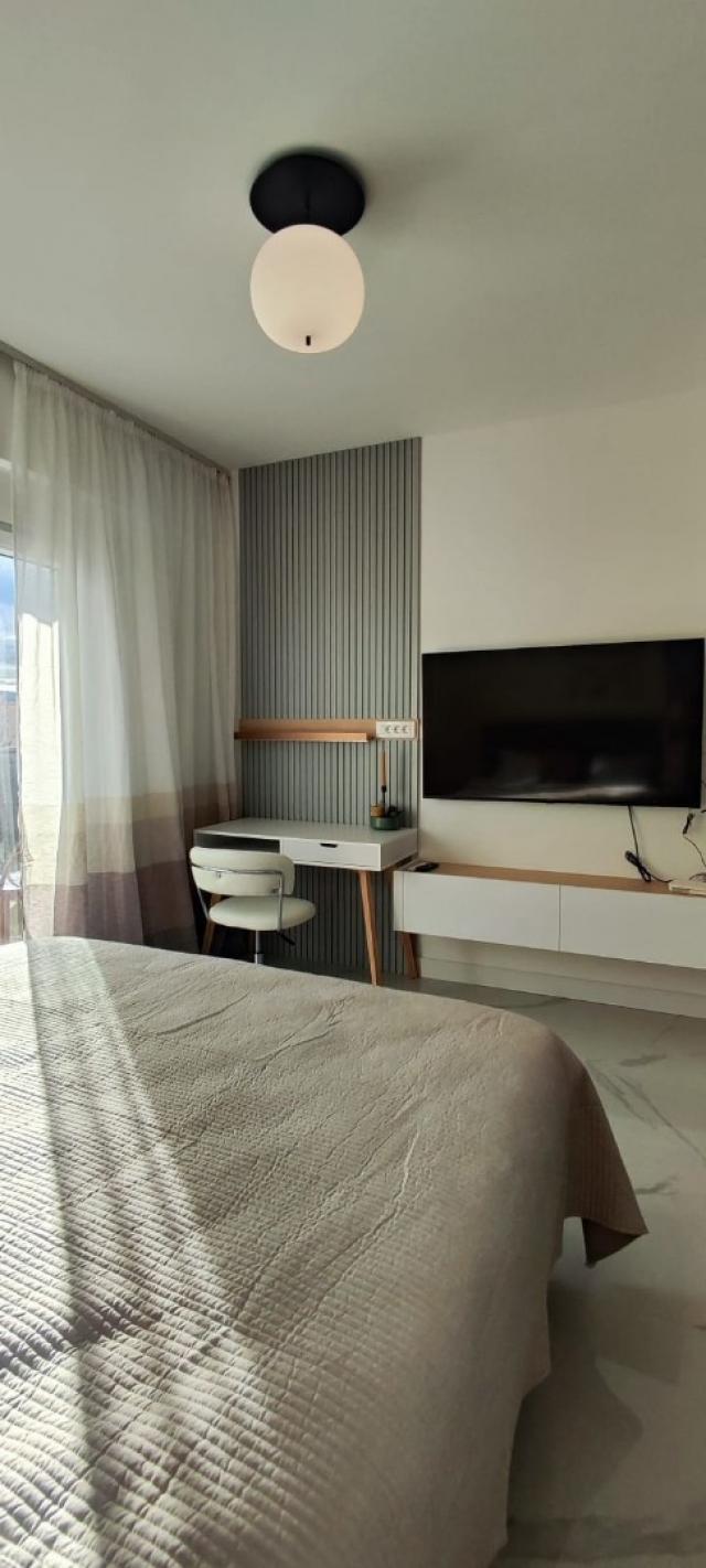 A studio apartment in a new modern residential complex with a swimming pool is for sale. 