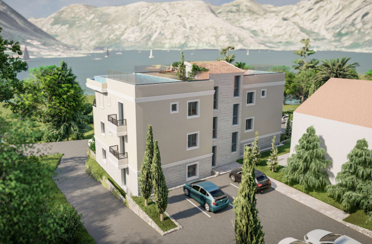Three bedroom apartment in a complex with a swimming pool in Dobrota
