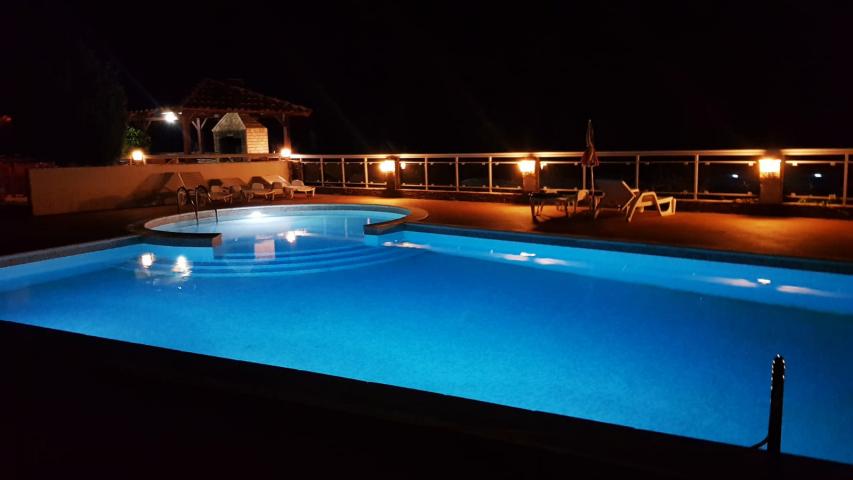 Apartment in Dobra Voda in a gated complex with a swimming pool