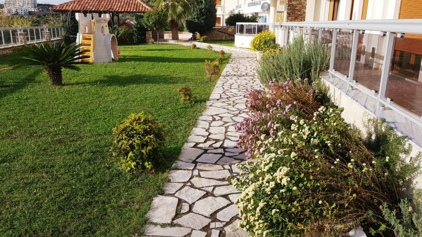 Apartment in Dobra Voda in a gated complex with a swimming pool