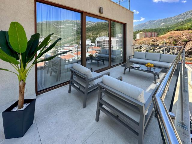 Premium apartment in a residential complex with a swimming pool located in Becici, a suburb of Budva