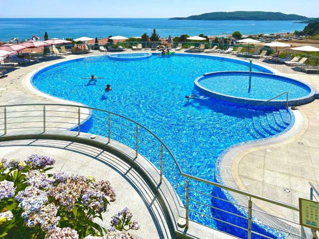 Premium apartment in a residential complex with a swimming pool located in Becici, a suburb of Budva