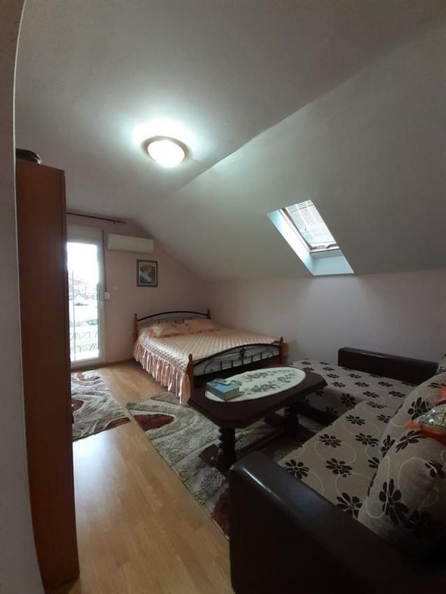 Two-storey house with a plot in Cetinje. 