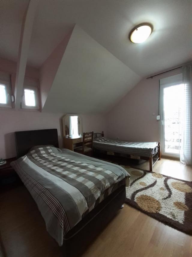 Two-storey house with a plot in Cetinje. 