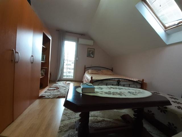 Two-storey house with a plot in Cetinje. 