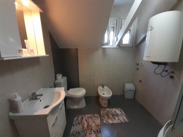 Two-storey house with a plot in Cetinje. 