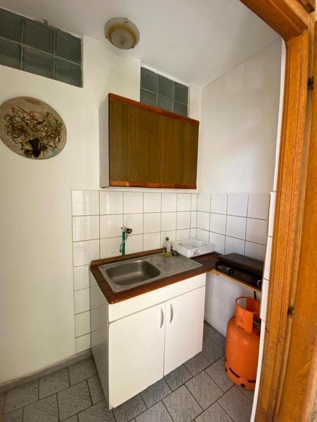 Part of a house with 8 apartments in Sutomore on the plain. 