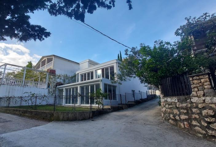 Three-storey house with panoramic views and a large terrace in Sutomore
