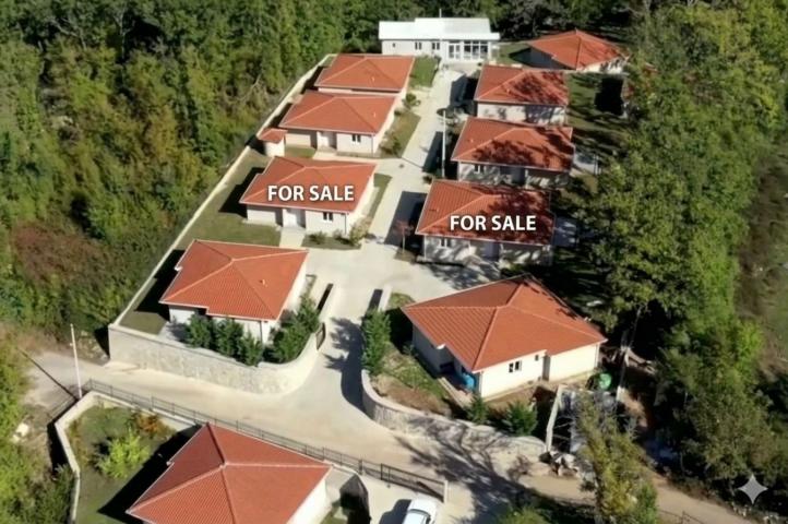 A 138 m² house is for sale in a cozy gated community in Bar, Montenegro.