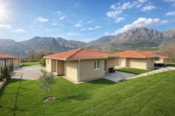 A 138 m² house is for sale in a cozy gated community in Bar, Montenegro.