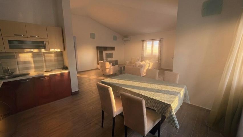 A 138 m² house is for sale in a cozy gated community in Bar, Montenegro.