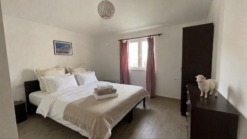 A 138 m² house is for sale in a cozy gated community in Bar, Montenegro.