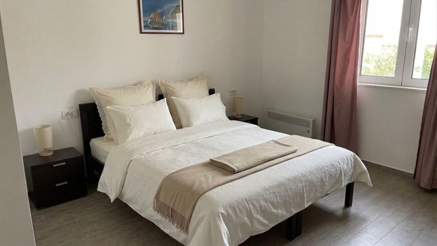 A 138 m² house is for sale in a cozy gated community in Bar, Montenegro.