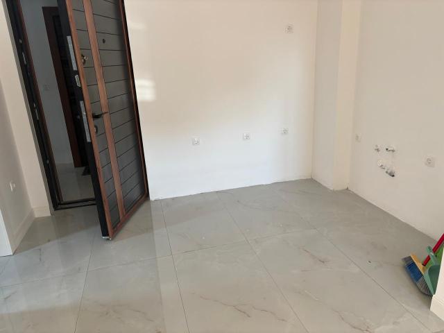 A studio apartment in a new building in Bar, behind the market, is for sale. 